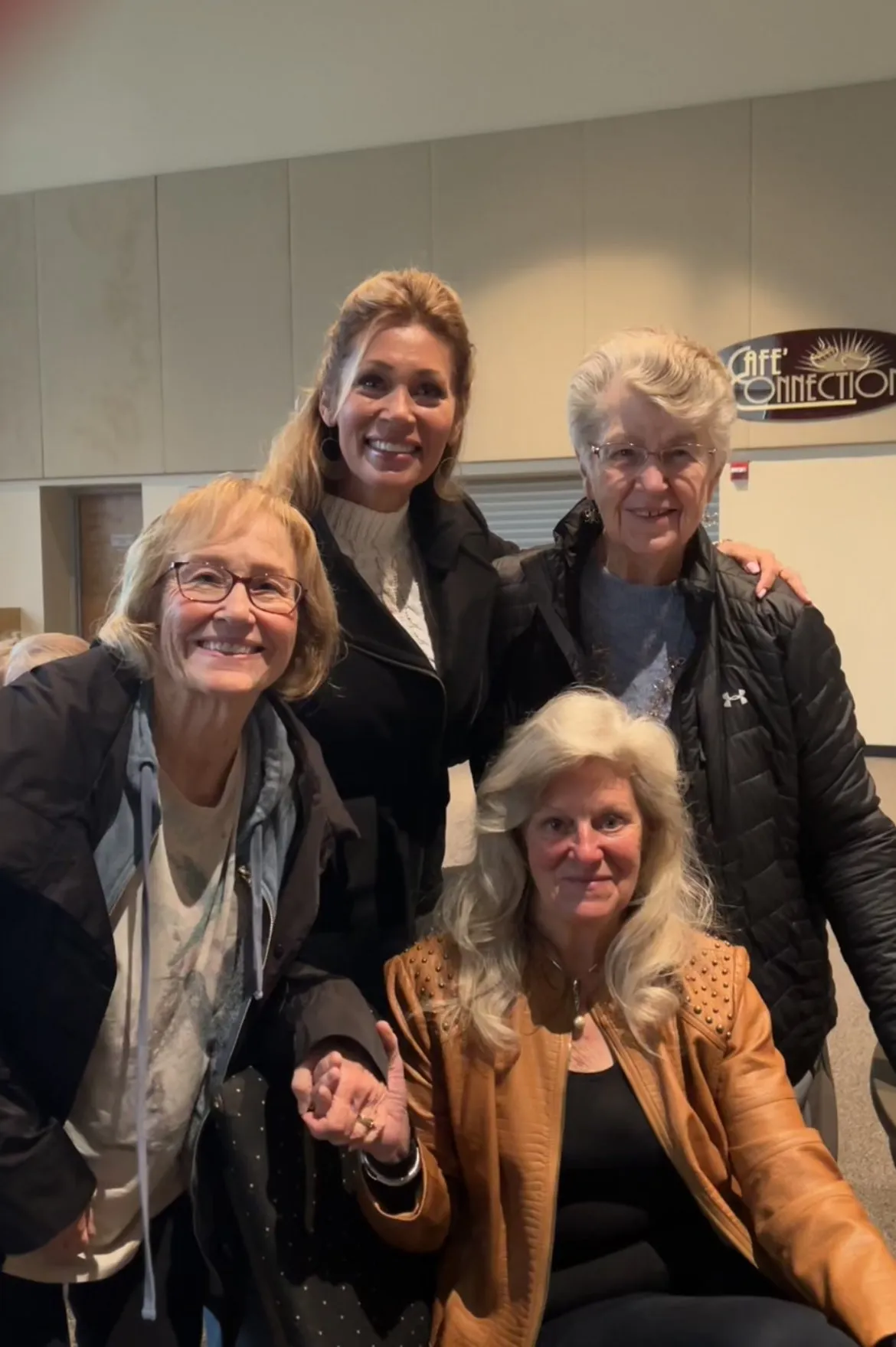 Michelle with a group of women at a community event